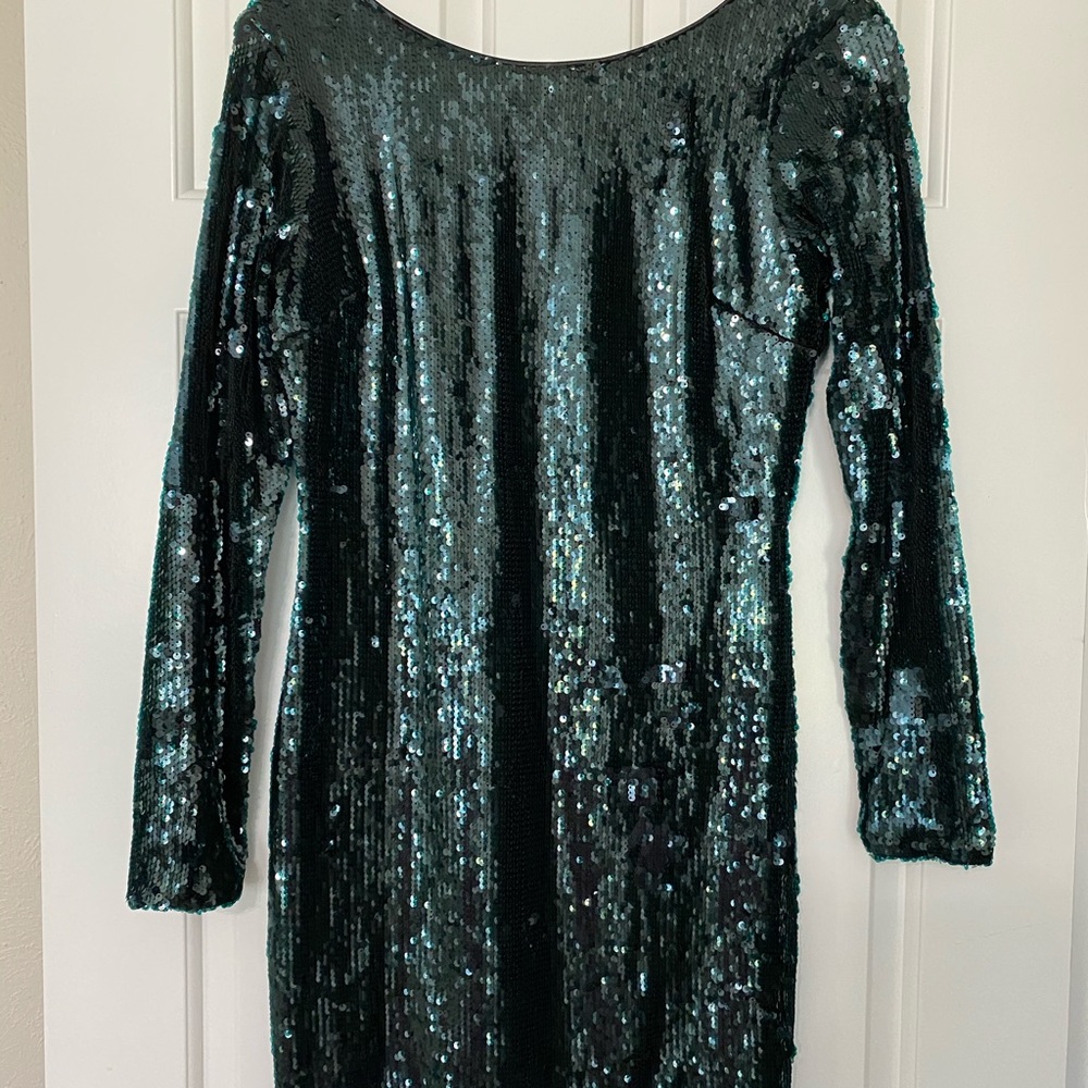 Sequence of low back dress